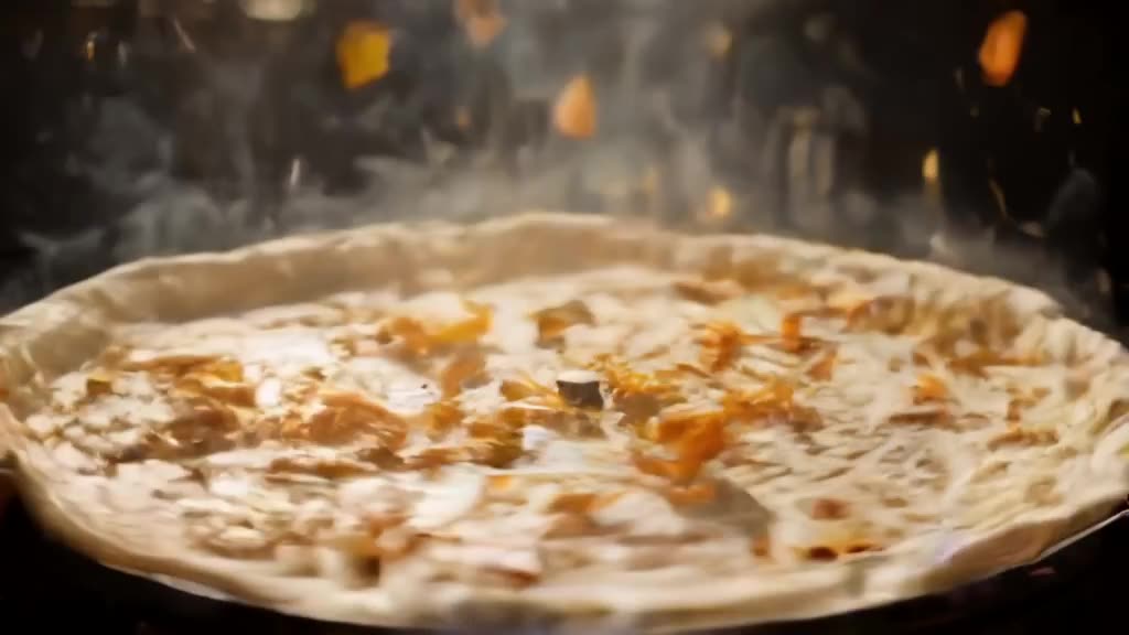 A vinyl record transforms into a spinning pizza oven. Dough spins rapidly, toppings fly u…