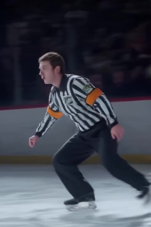 A penguin in a referee uniform blows a whistle, then immediately slips on a patch of ice.…