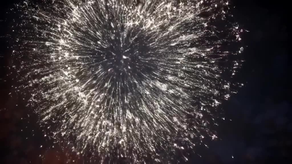 Barista drops a sugar cube. It explodes into a burst of sparkling fireworks that form the…