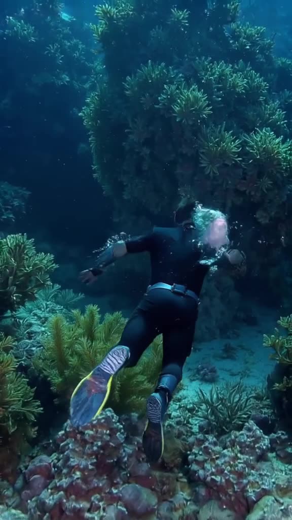 Deep underwater, a speedster hero zooms so fast he creates a vacuum bubble around a surpr…