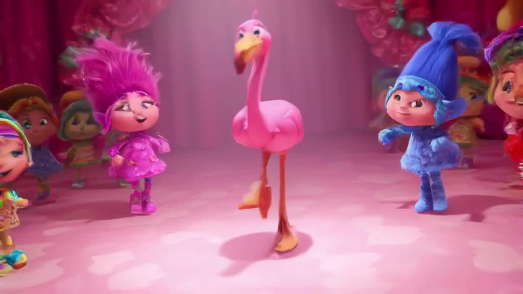 A robot shaped like a flamingo performs a high-energy jazz routine on a pastel pink stage…