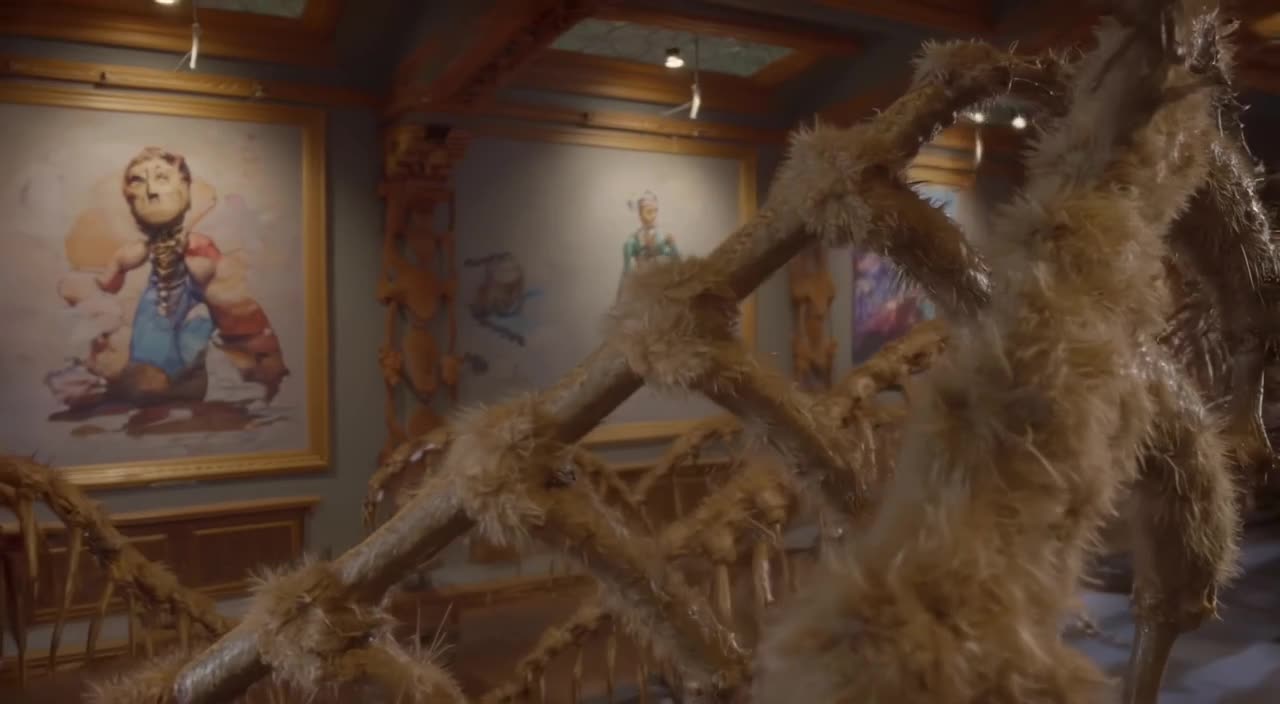 A dinosaur skeleton in a museum reassembles itself as music plays. Bones click together s…