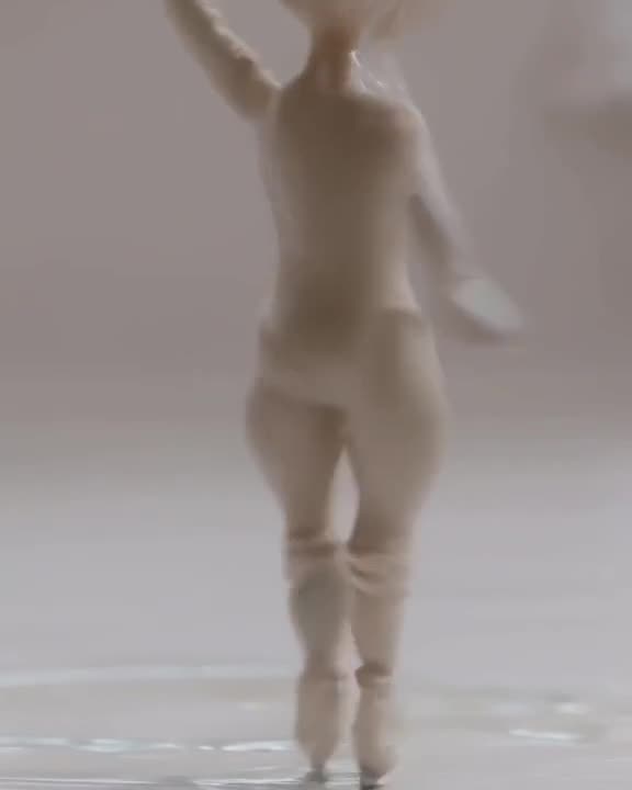 A porcelain doll with jointed limbs performs a ballet spin, leaving trails of iridescent …