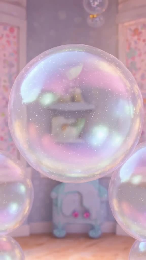 A bubble wand floats through a room, creating huge iridescent bubbles that reflect miniat…