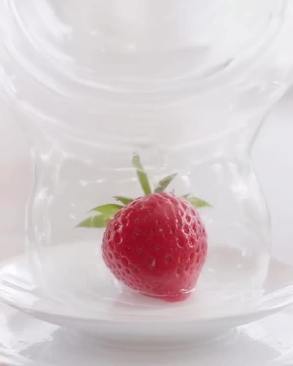 A gelatin mold is inverted onto a plate, wobbling like jelly before settling perfectly. I…