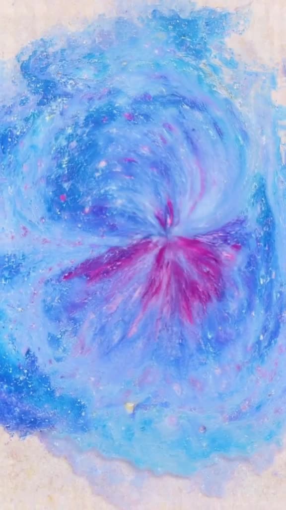 Paint mixing in water creates swirling galaxies of color without stirring. Vibrant blues …