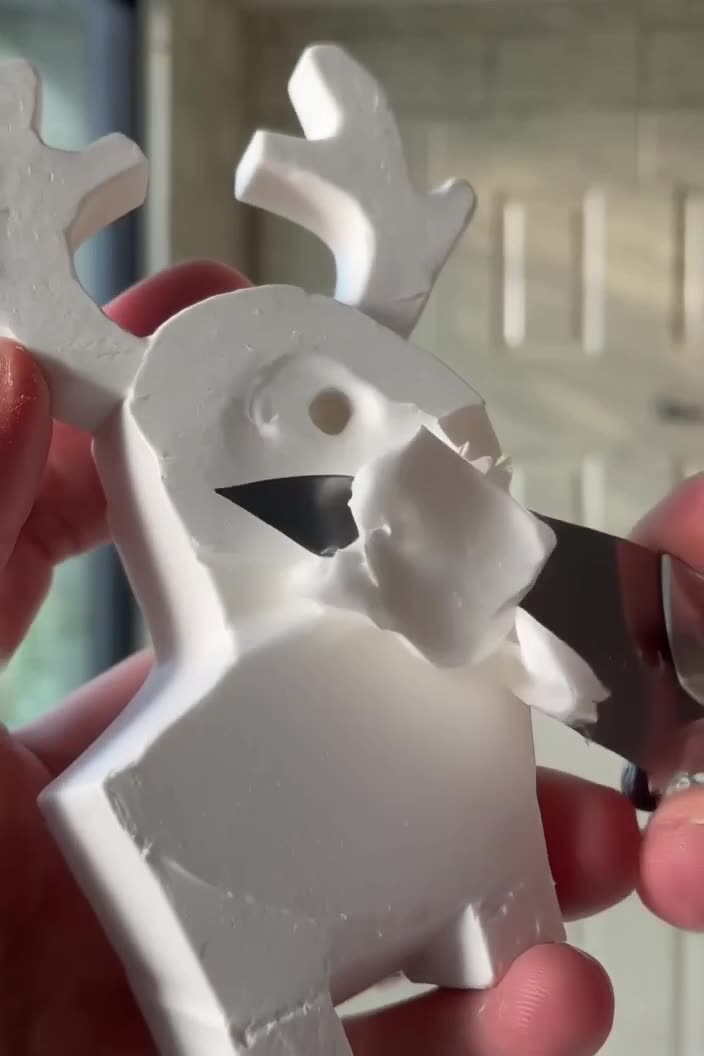 Soap operas soap carving: a block of white soap is intricately carved into a reindeer sha…